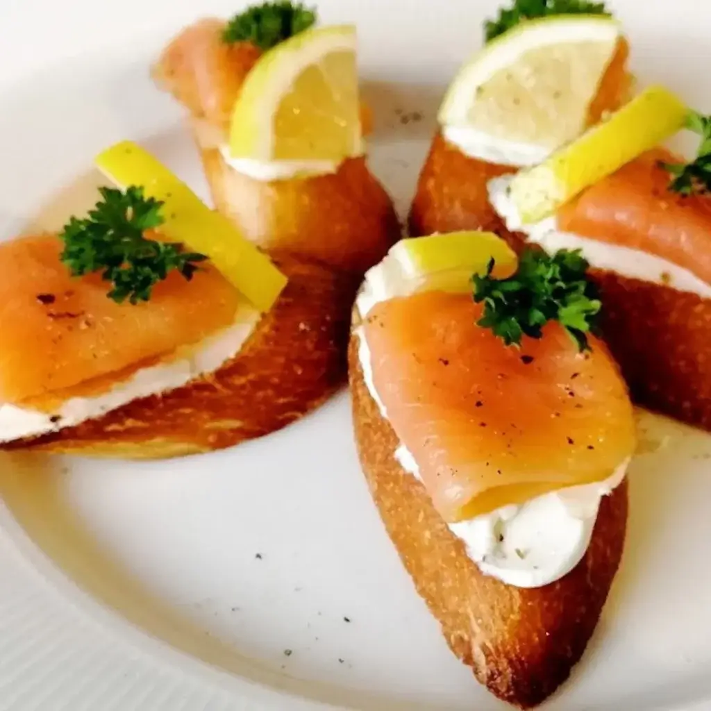 Smoked Salmon & Cream Cheese Pintxo (Cold Pintxos Recipe) arranged in round and served on plate