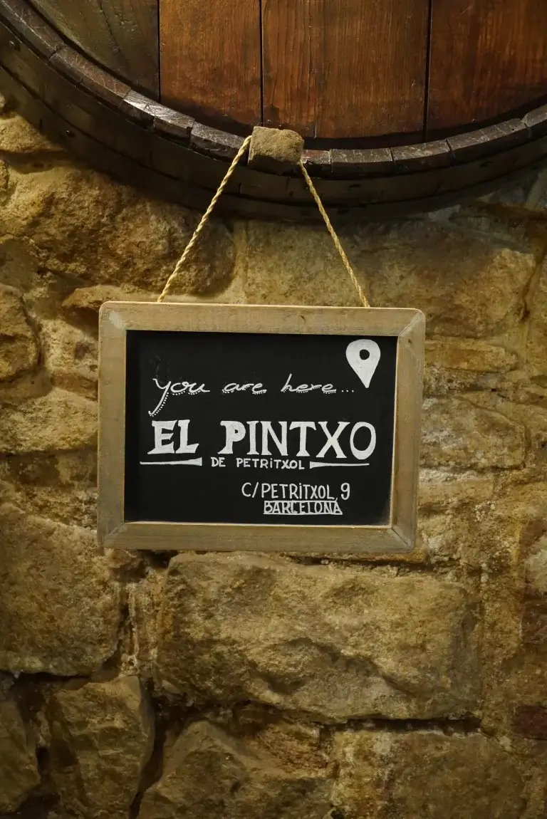 a billboard saying "you are at El pintxo" as an advert for our best tapas bar in gothic quarter